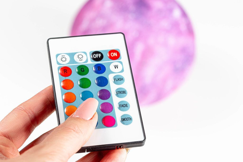 Night light in the form of a shining moon on a wooden stand - Creative ...